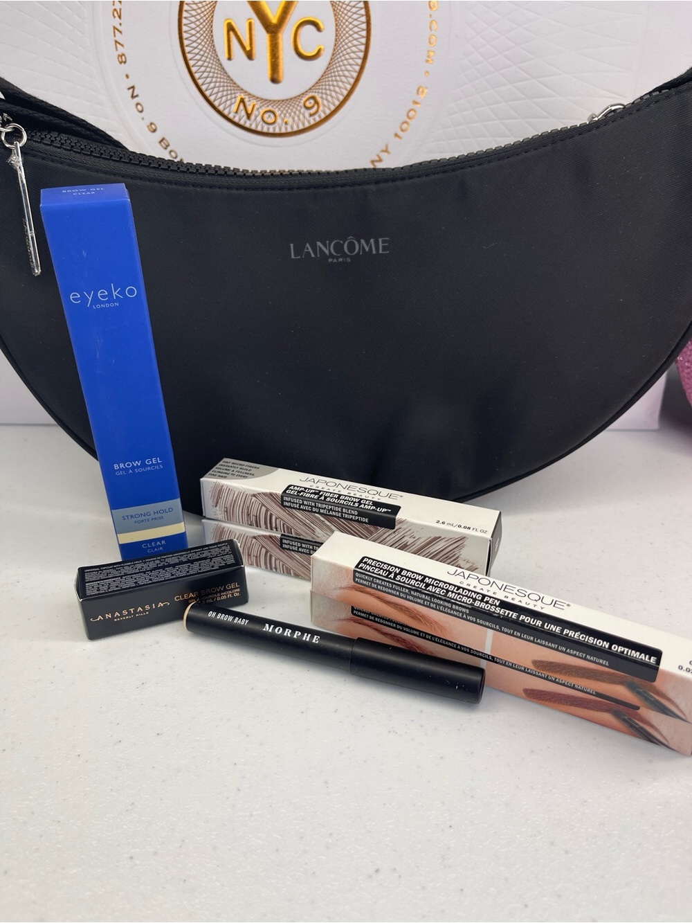 Lancôme Black Cosmetic Pouch/crossbody bag with Assorted eyebrow items!!